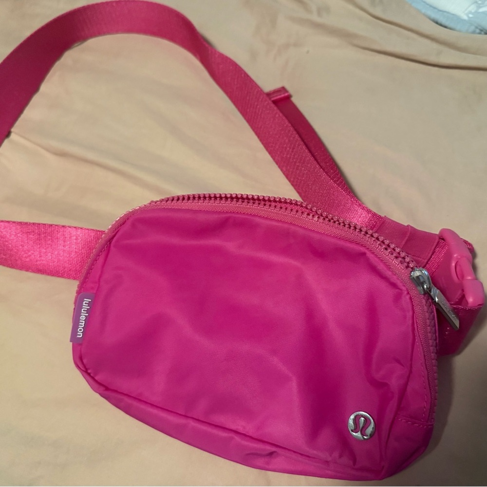 Lululemon Athletica Pink Crossbody Bag with Sleek Design